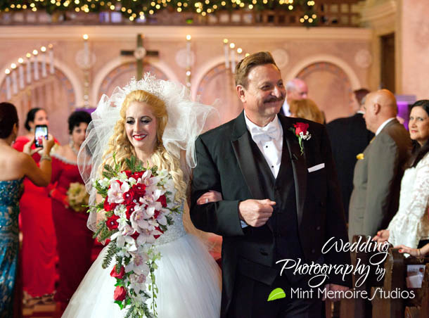 The Bride and the Groom walking out the isle