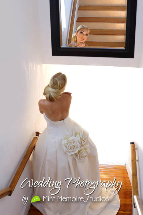bride looking at a mimrror